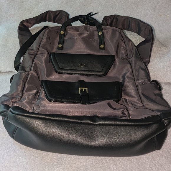 Tutilo charcoal gray with black trim backpack. main image 11